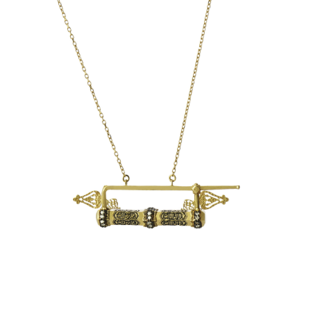 18-karat gold, green enamel, and diamond-detailed Âlem-i Sır Necklace.