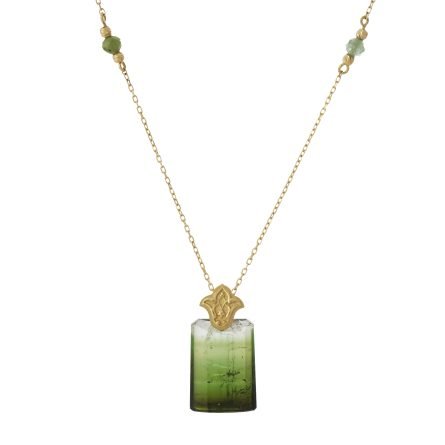 18-karat gold, raw cut green tourmaline (or two-tone) stone, lily/lotus motif, crystal column-shaped luxury necklace.