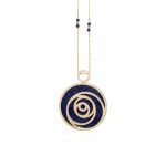 Luxury necklace with 18-karat gold and diamond details, featuring a spiral (vortex) motif set with diamonds on a lapis lazuli base.