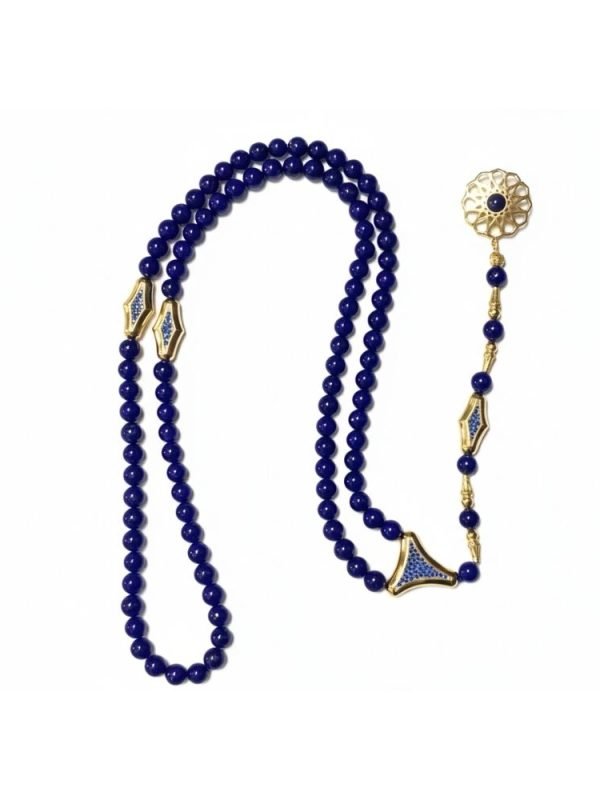 Altın kaplama gümüş aksamlı ve derin lacivert renkli 99 adet doğal lapis lazuli taşından oluşan lüks tesbih tasarımı.