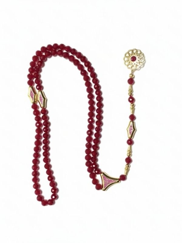 925 ayar gümüş ve altın kaplama aksamlı, 99 adet doğal yakut taşından oluşan lüks tesbih tasarımı.