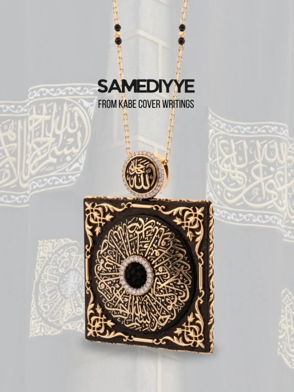 18-karat gold pendant design featuring a Kaaba cover motif on black ebony